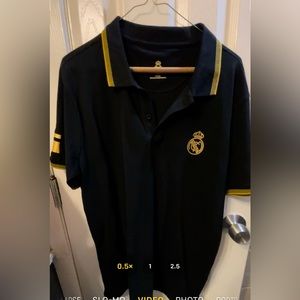 Real Madrid team. Original Polo, is new with no tag I